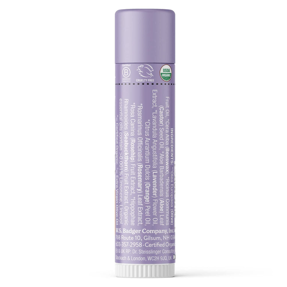 Badger Lavender Orange lip balm texture appears silky for easy application.