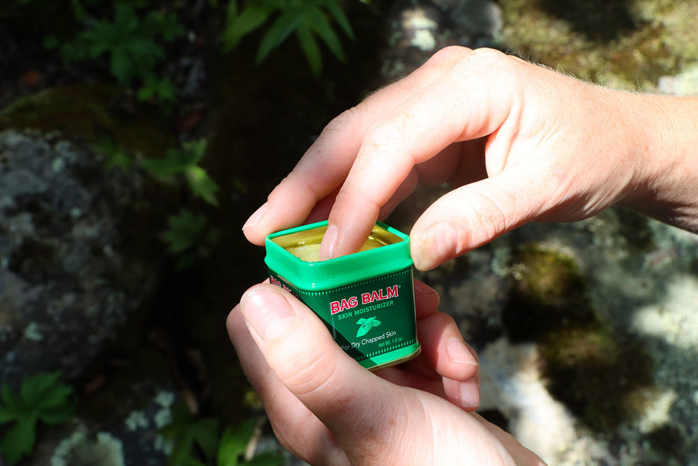 Bag Balm applied to hands and body demonstrating head to toe moisturization