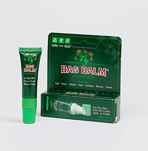 Bag Balm hand-application focus demonstrating everyday skin care.