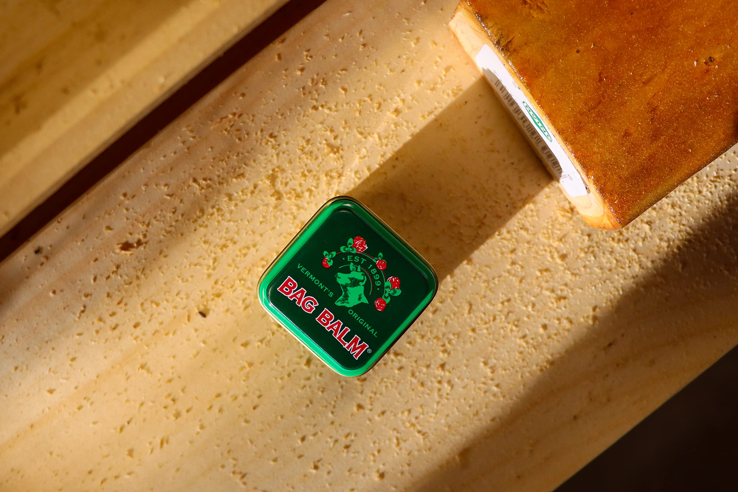 Bag Balm mini tin gift box open highlighting portable skincare on the go
