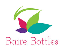 Organized bathroom sink featuring Baire Bottles refillables for spa look