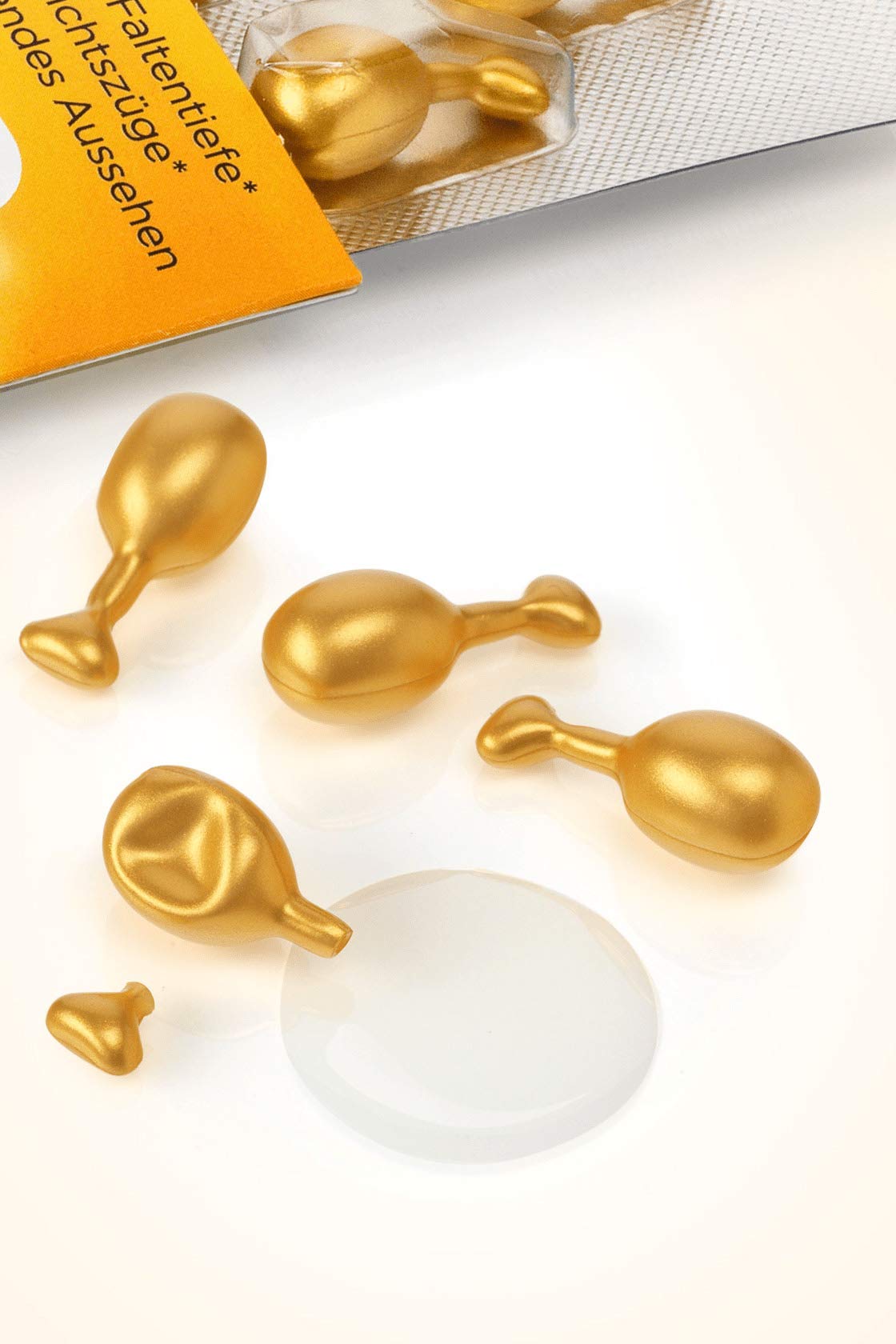 Close-up of Balea oil bottle highlighting fast absorption for silky skin.
