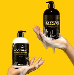 Creamy lather in a hand with Ballsy Goodhead shampoo, signaling cleansing and moisturizing benefits