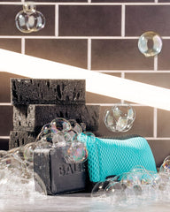 Ballsy Handy Shower Tool blue packaging for a compact bath accessory.