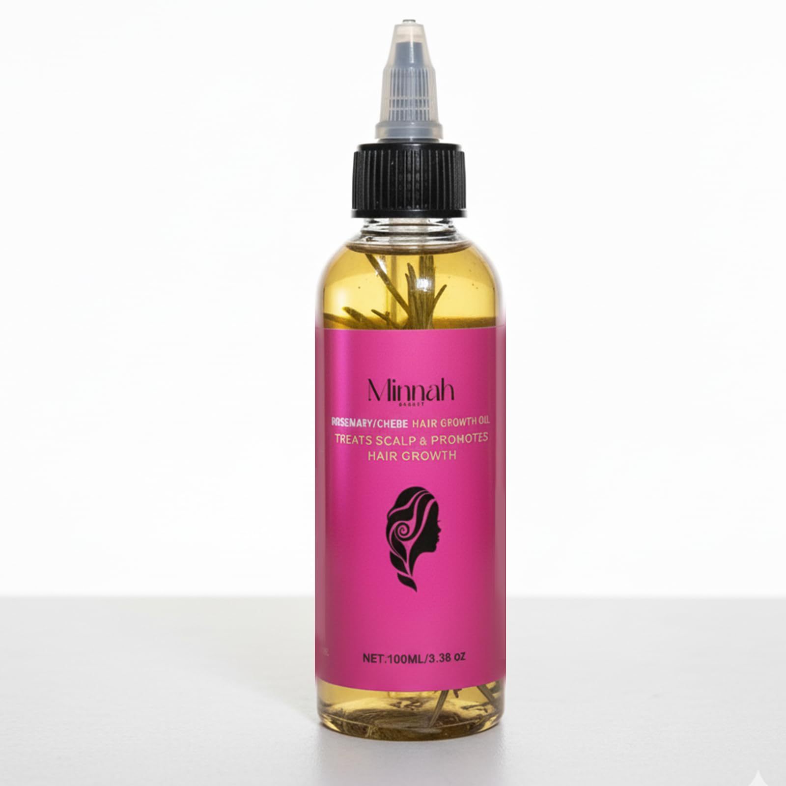 BALPPRD Minnah Batana Oil bottle pour for easy scalp nourishment.