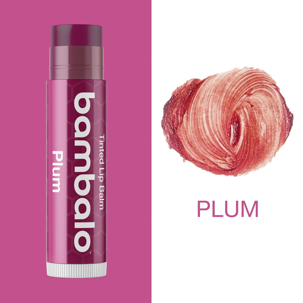 Bambalo Plum tinted lip balm application demonstrates subtle tint for everyday wear.