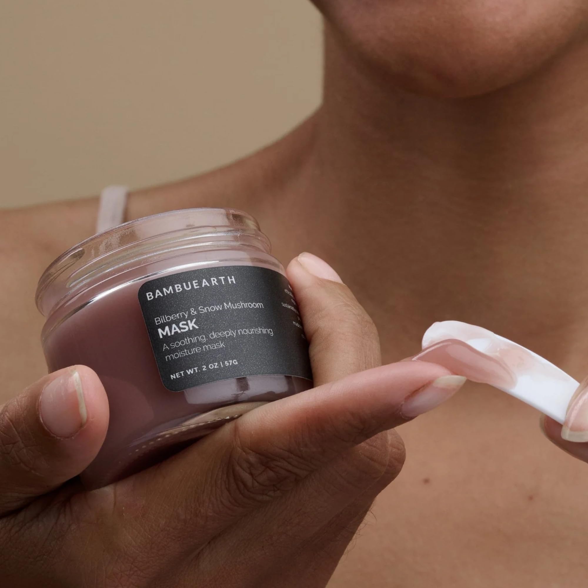 BAMBU EARTH Bilberry and Snow Mushroom Mask hydration glow on fresh-faced model.