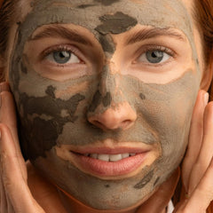 BAMBU EARTH mud mask spread on skin demonstrates even application and cleansing