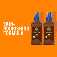 Banana Boat Deep Tanning Spray Oil ingredients close-up: cocoa butter, banana extract.
