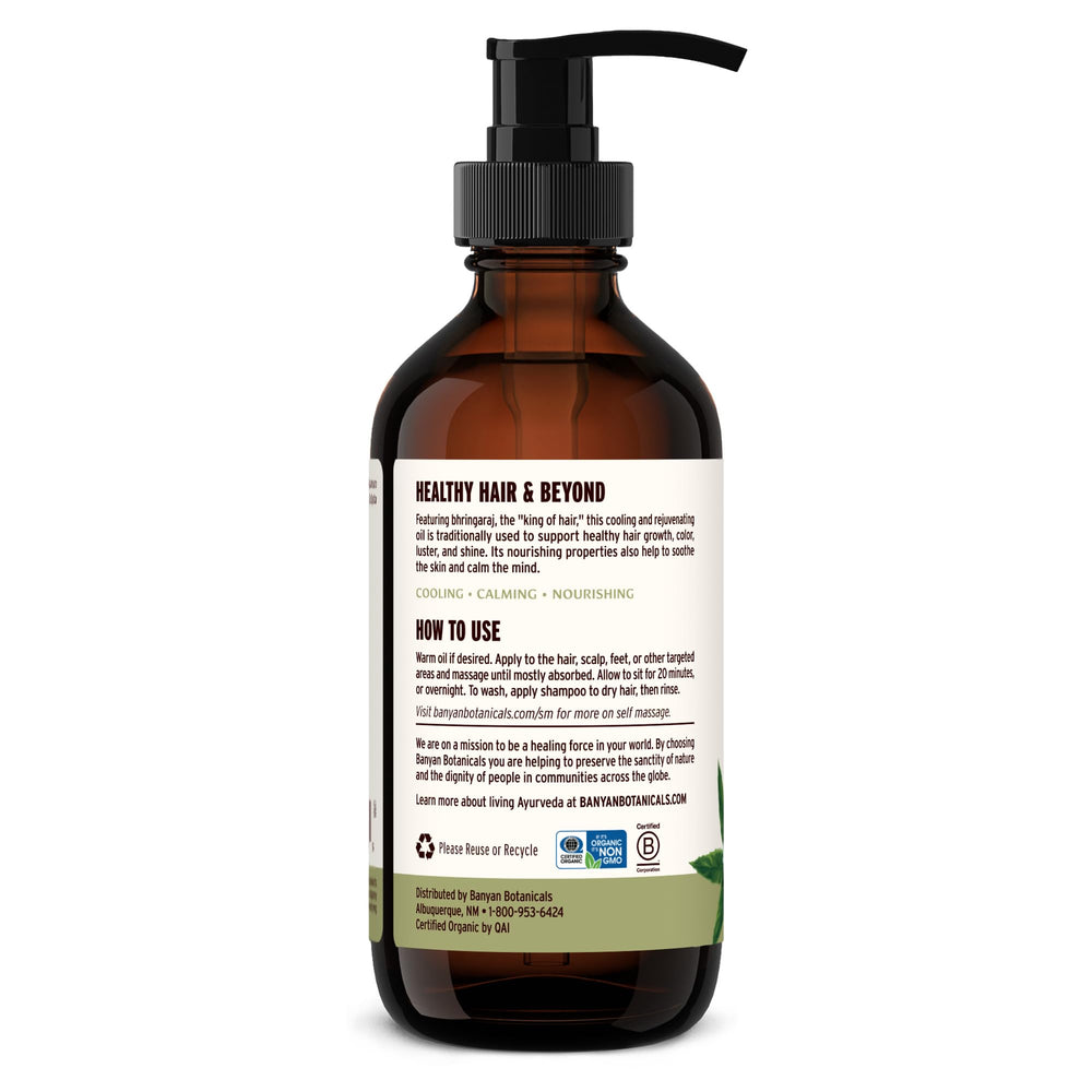 Banyan Botanicals Bhringaraj Oil application tip for soothing scalp massage.