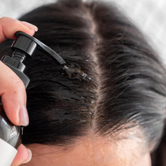 Banyan Botanicals Bhringaraj Oil on hair with natural shine after use.