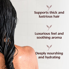 Banyan Botanicals Organic Hair Oil amber bottle close-up highlights premium natural ingredients.