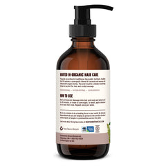 Banyan Botanicals Organic Hair Oil packaging emphasizes eco-friendly sourcing.
