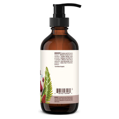 Banyan Botanicals Organic Hair Oil bottle pouring suggests a soothing daily ritual.