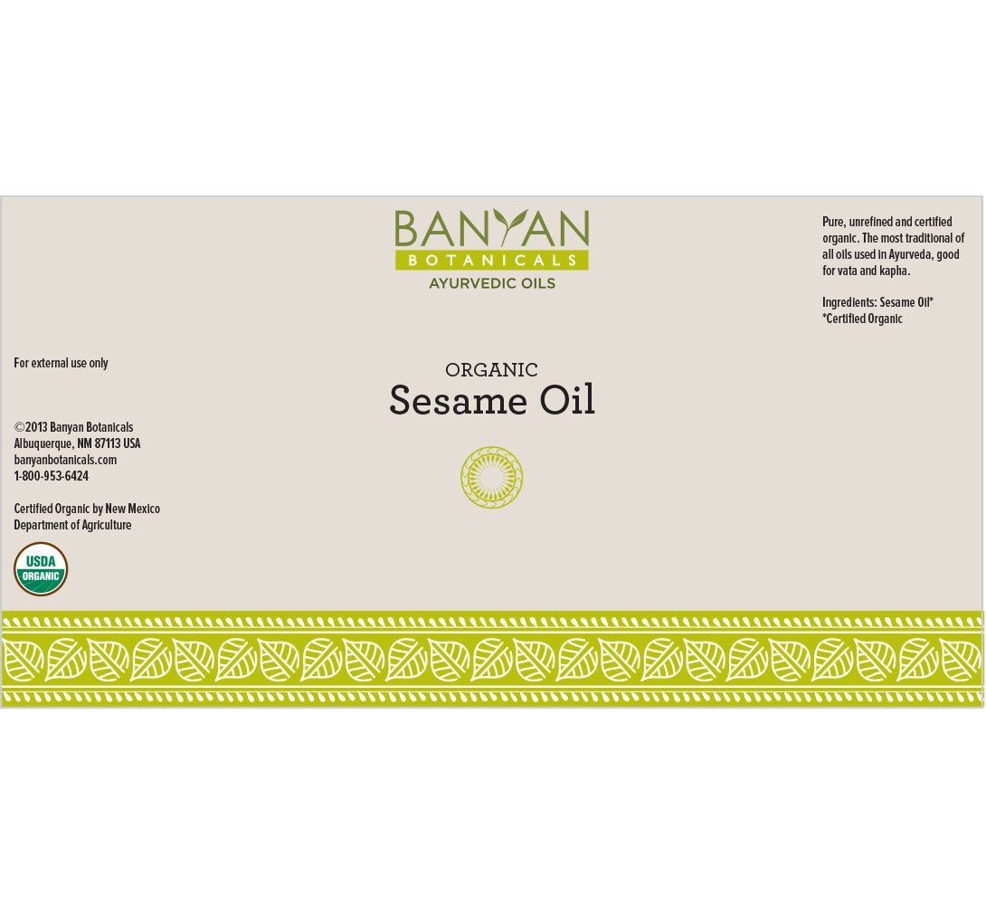 Close-up pour spout on Banyan Botanicals sesame oil for easy use.