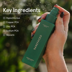 Person using Clean Slate Spritz during a busy day for a quick refresh