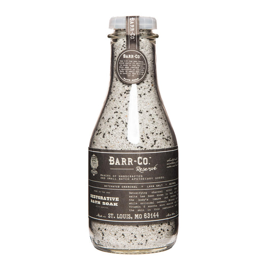 Barr-Co Reserve bath salts jar with woodsy earthy scent for a calming soak.