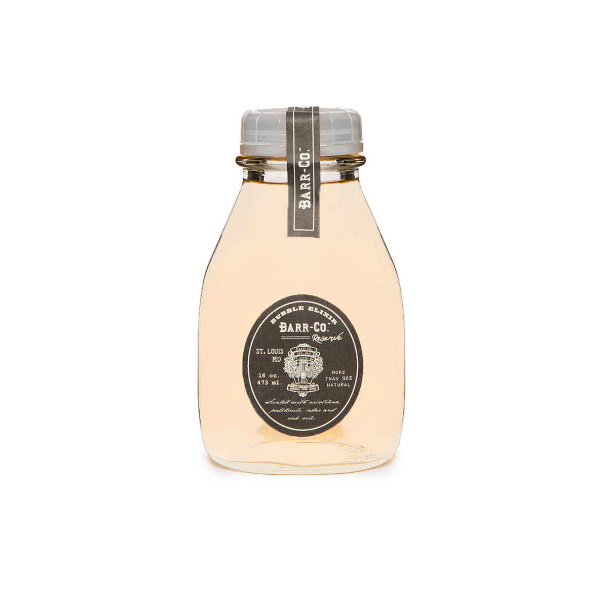 Barr-Co Reserve Bubble Bath Elixir bottle with earthy aroma for a calming soak.