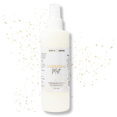Bask & Lather Hydrating Hair Mist bottle offers detangling and hydration.