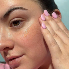 Daily Bask Suncare SPF 40 applied under makeup for a smooth base