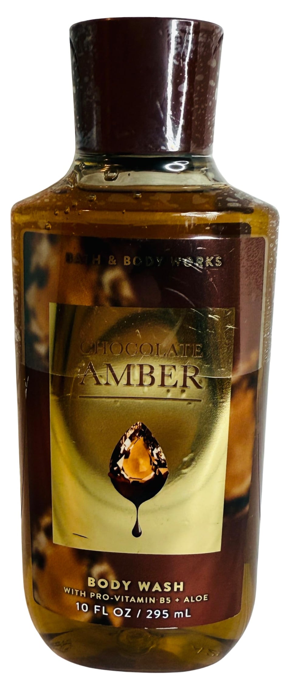 Bath & Body Works Chocolate Amber body wash bottle with rich hydration.