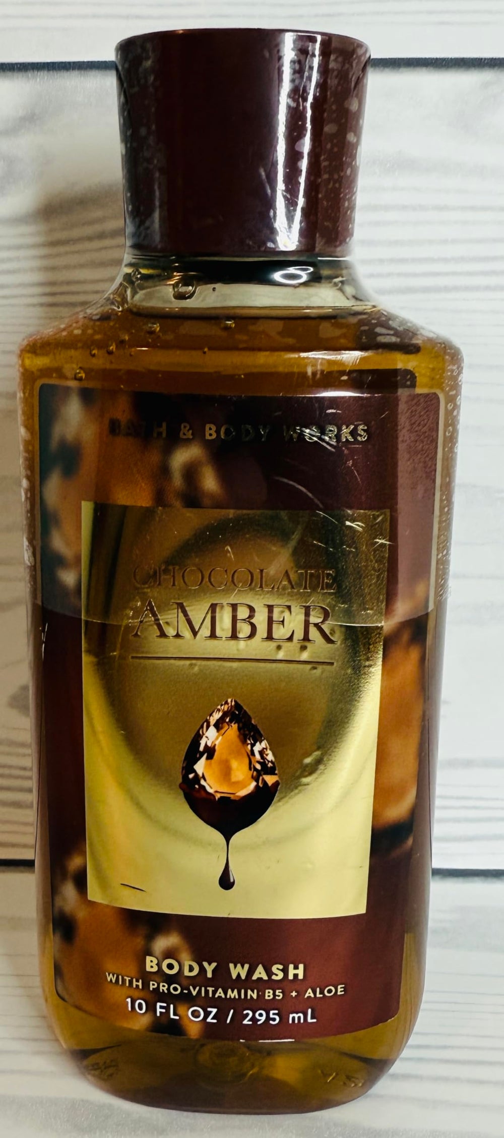 Bath & Body Works Chocolate Amber body wash fragrance close-up showing warm notes.