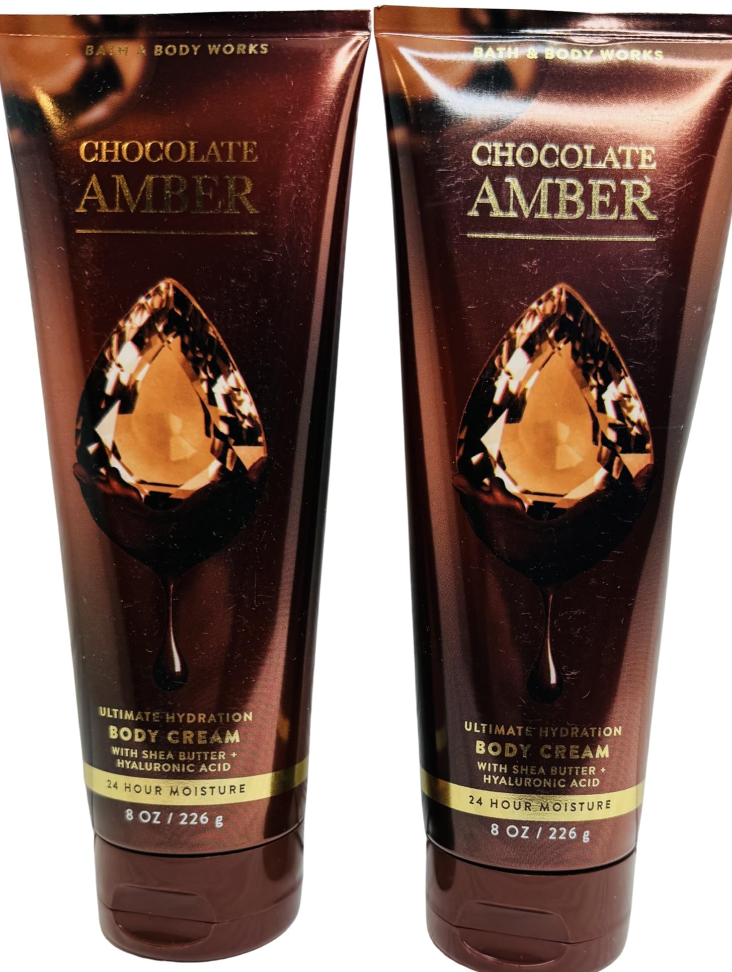 Bath & Body Works Chocolate Amber Ultimate Hydration Cream bottle showcases rich texture and inviting scent.