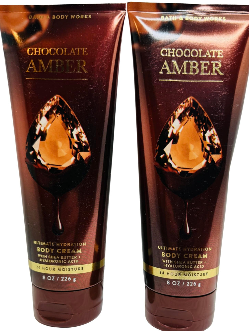 Bath & Body Works Chocolate Amber Ultimate Hydration Cream bottle showcases rich texture and inviting scent.