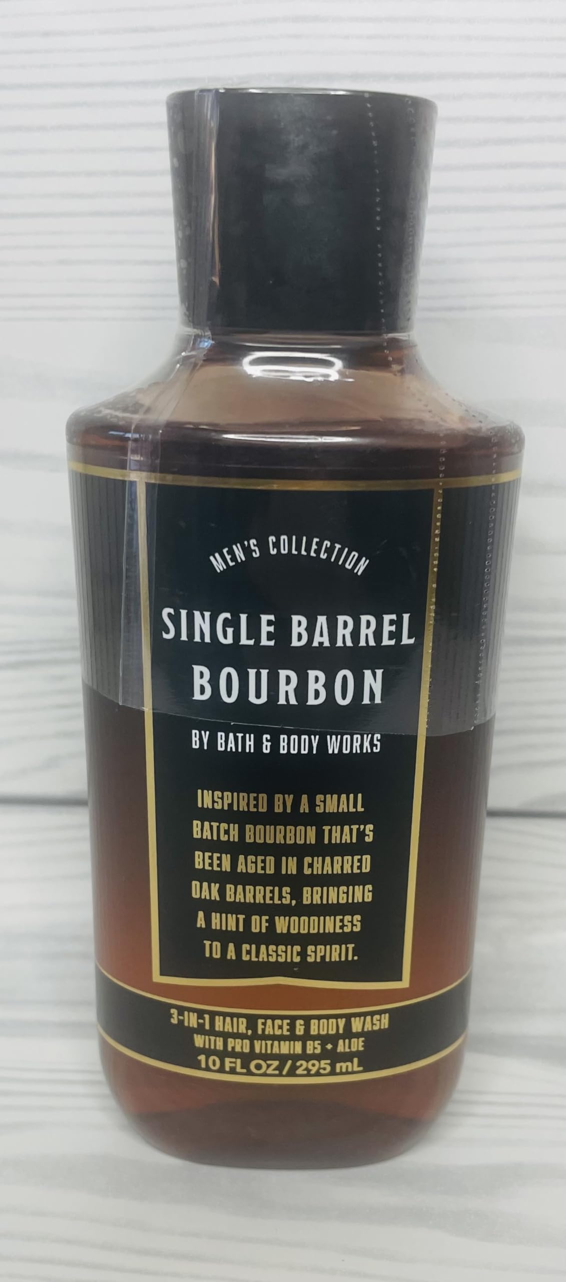 Bath & Body Works Men's Single Barrel Bourbon label highlighting spiced citrus and oak notes.