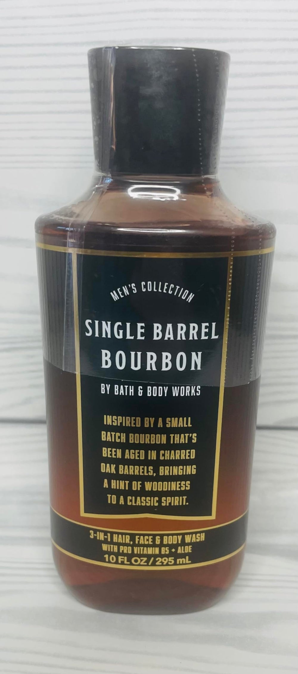Bath & Body Works Men's Single Barrel Bourbon label highlighting spiced citrus and oak notes.