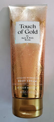 Close-up of Touch of Gold fragrance noting blackberry and orange blossom aroma.