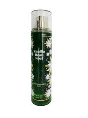 Vanilla Bean Noel spray bottle in hand, uplifting scent for cozy evenings.