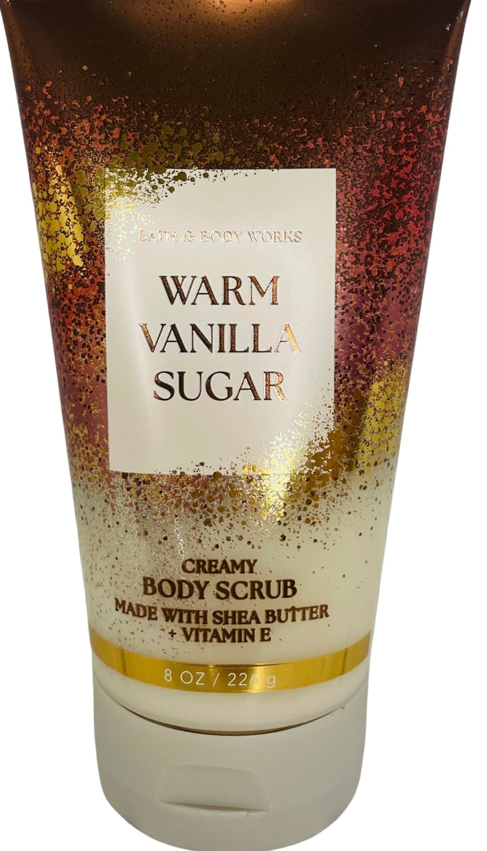 Bath & Body Works Warm Vanilla Sugar Scrub jar close-up shows creamy texture for silky skin.