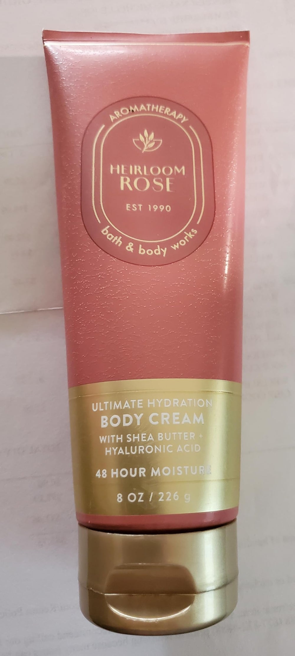 Bath & Body Works Aromatherapy Heirloom Rose cream on hand shows quick absorption.