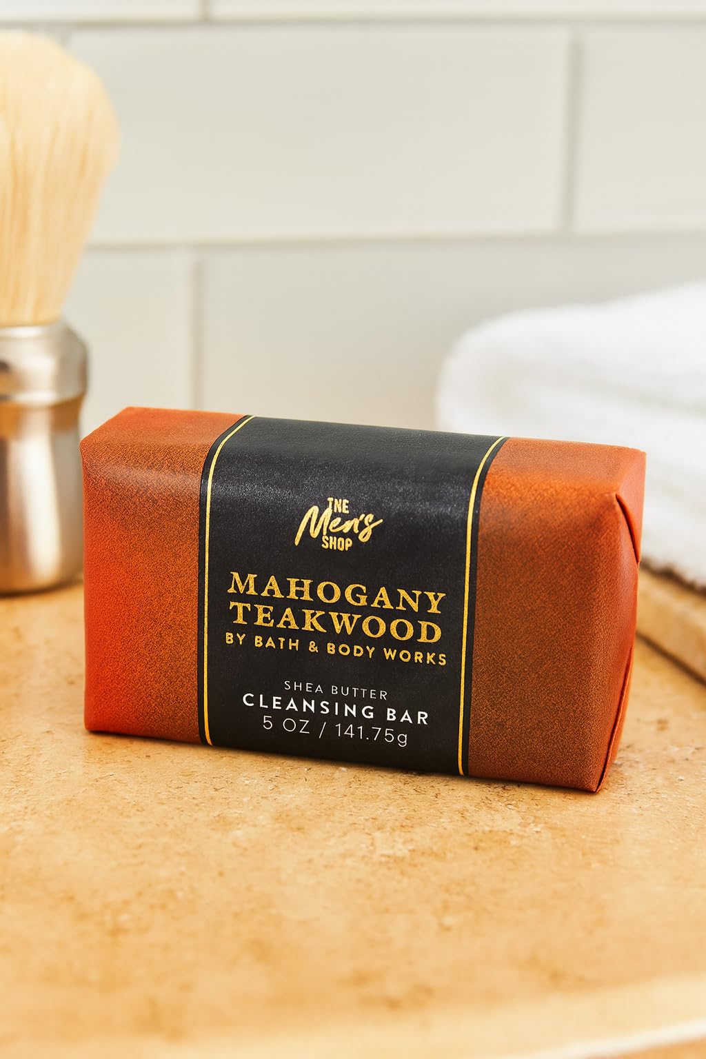 Close-up of Mahogany Teakwood cleansing bar highlighting rich lather