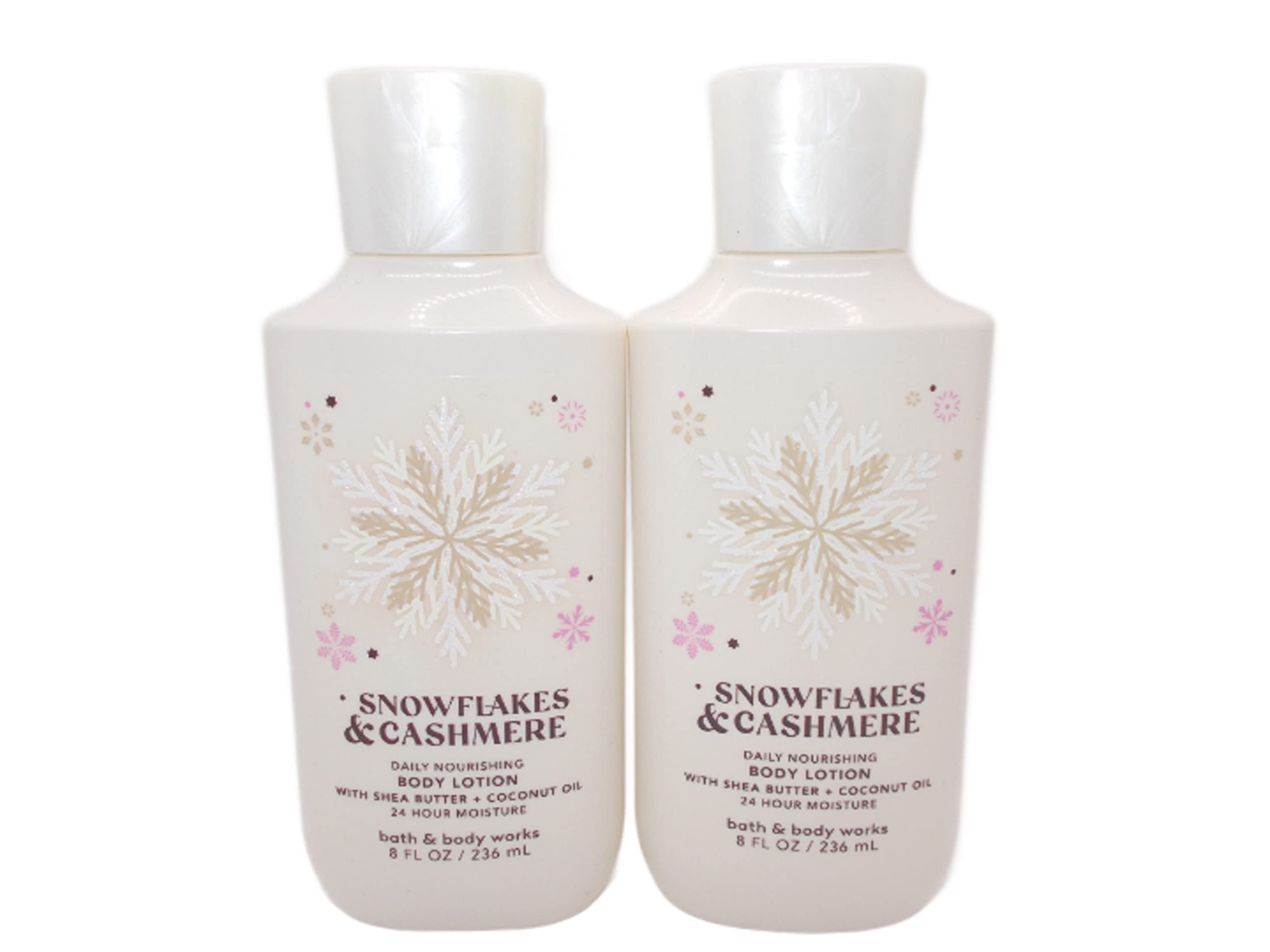 Bath & Body Works Snowflakes & Cashmere 8 oz lotion bottles for daily hydration.