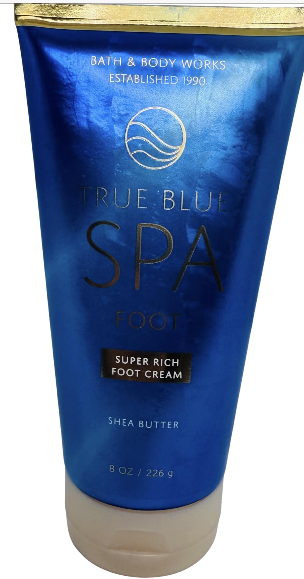 Bath and Body Works True Blue Spa foot cream bottle with mint scent for pampering feet.