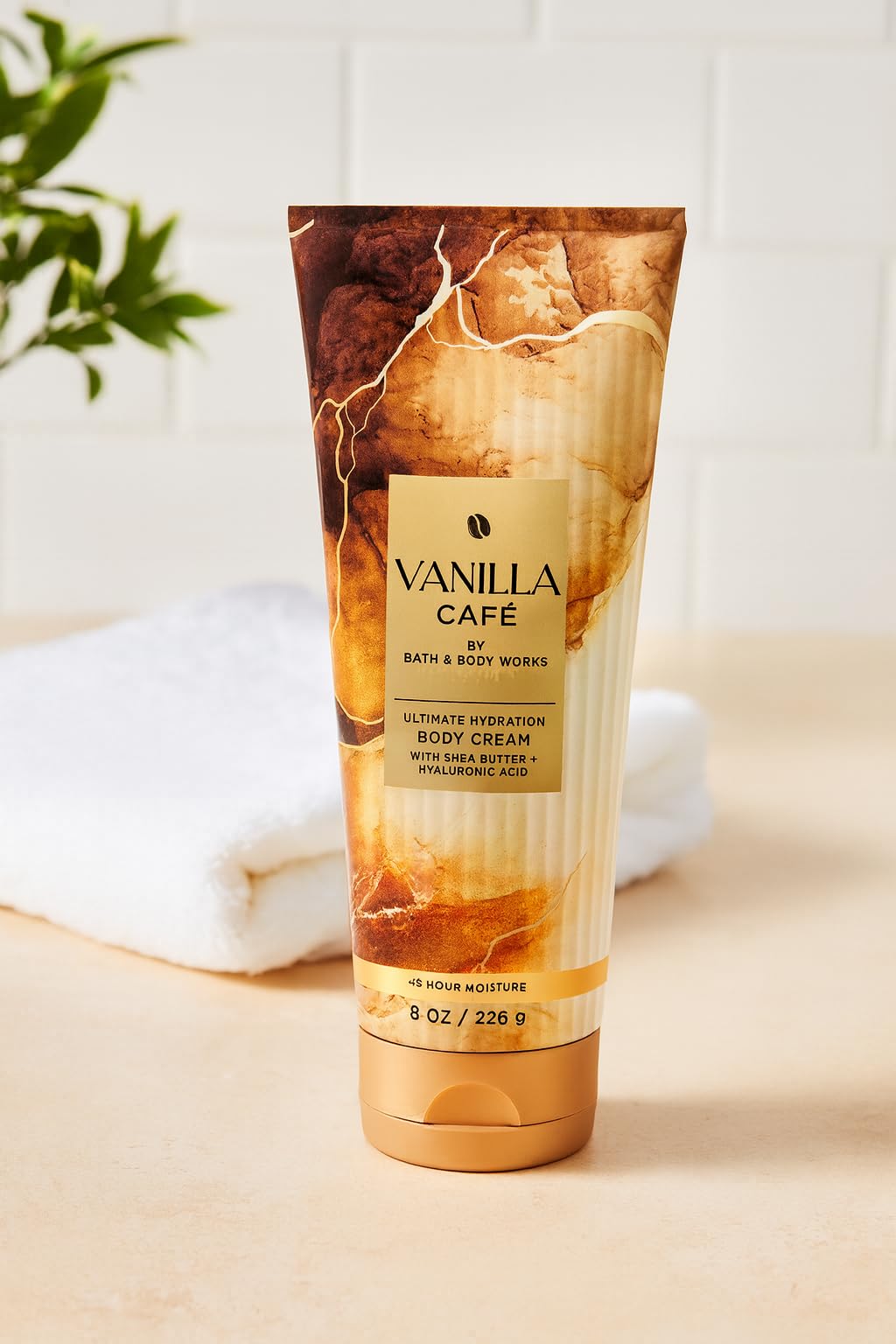 Bath & Body Works Vanilla Café tubes display, cozy vanilla aroma for daily moisturizing and fragrance layering.
