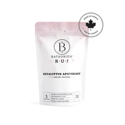 Crush bath dissolving in water creating a creamy, hydrating soak