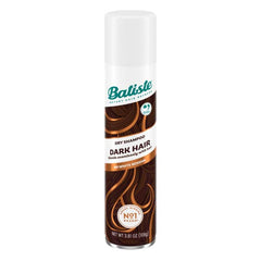 Batiste Dry Shampoo dispense action for quick, residue-free refresh.