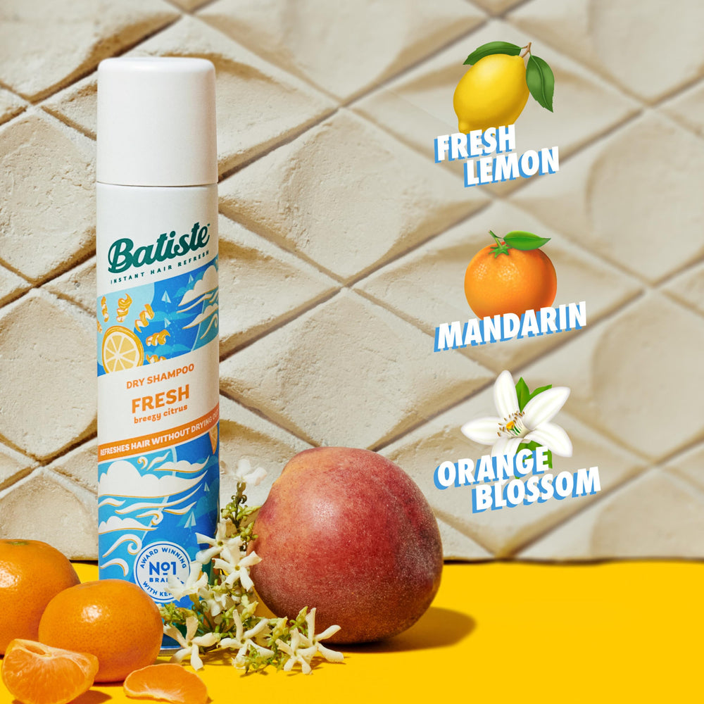Shake and dispense action of Batiste Fresh Dry Shampoo.