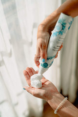 Batiste travel-size bottle in gym bag for on-the-go refresh