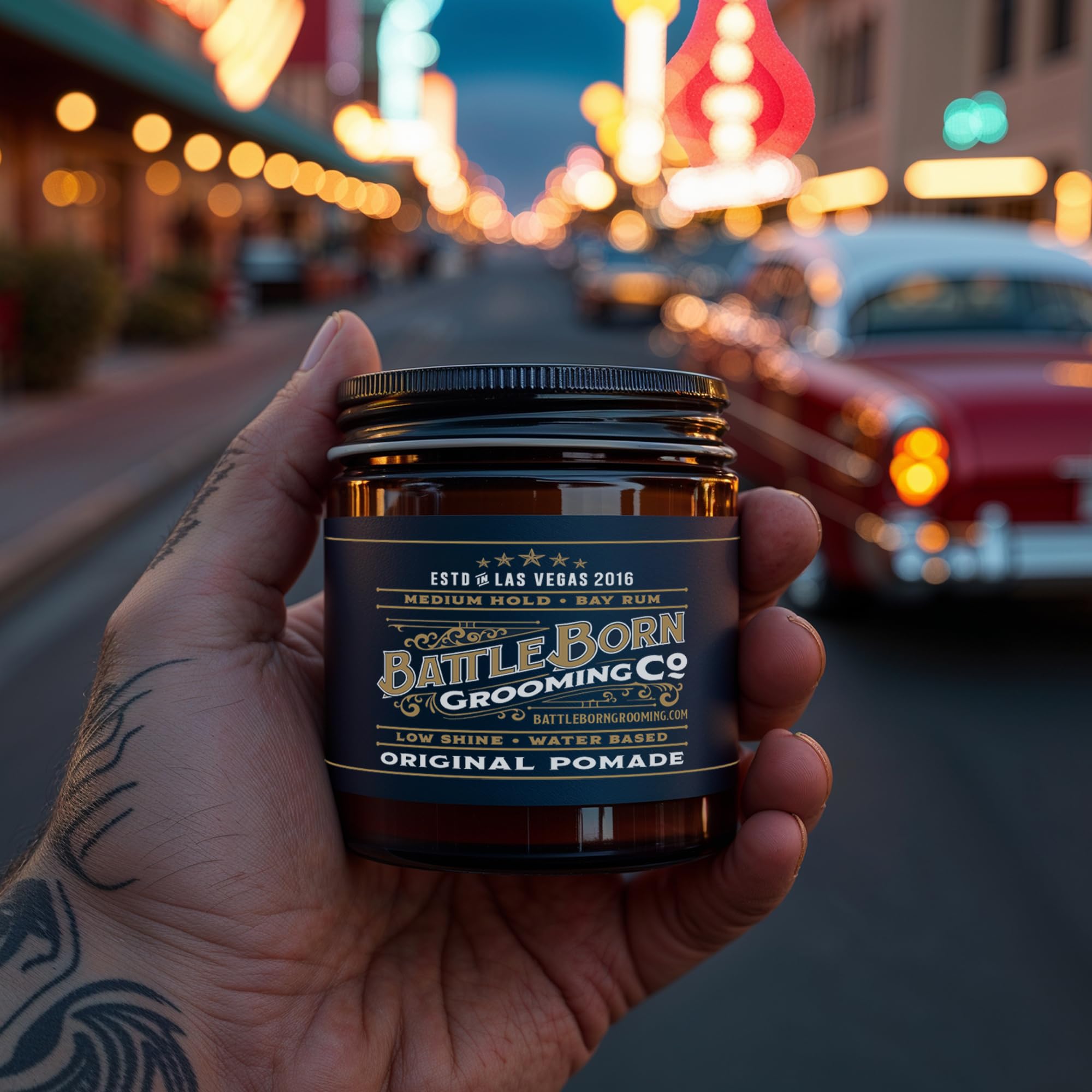 Battle Born Original Pomade barber-shop display conveys versatile styling options