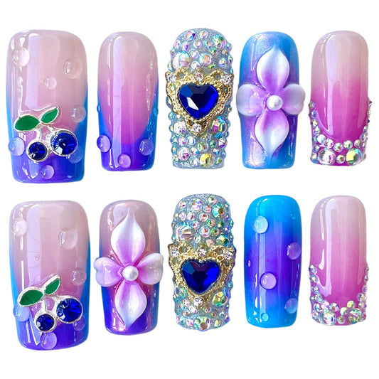 BByogooz nails in pink-blue ombre with 3D flowers and rhinestones for glamorous at-home manicures