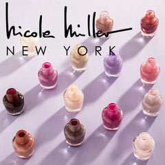 Nicole Miller nail polish colors arranged in a display tray for easy selection.