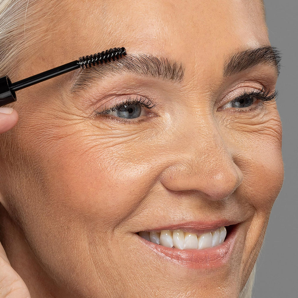 Billion Dollar Brows clear gel coats brows evenly for over-product or bare-brow use.