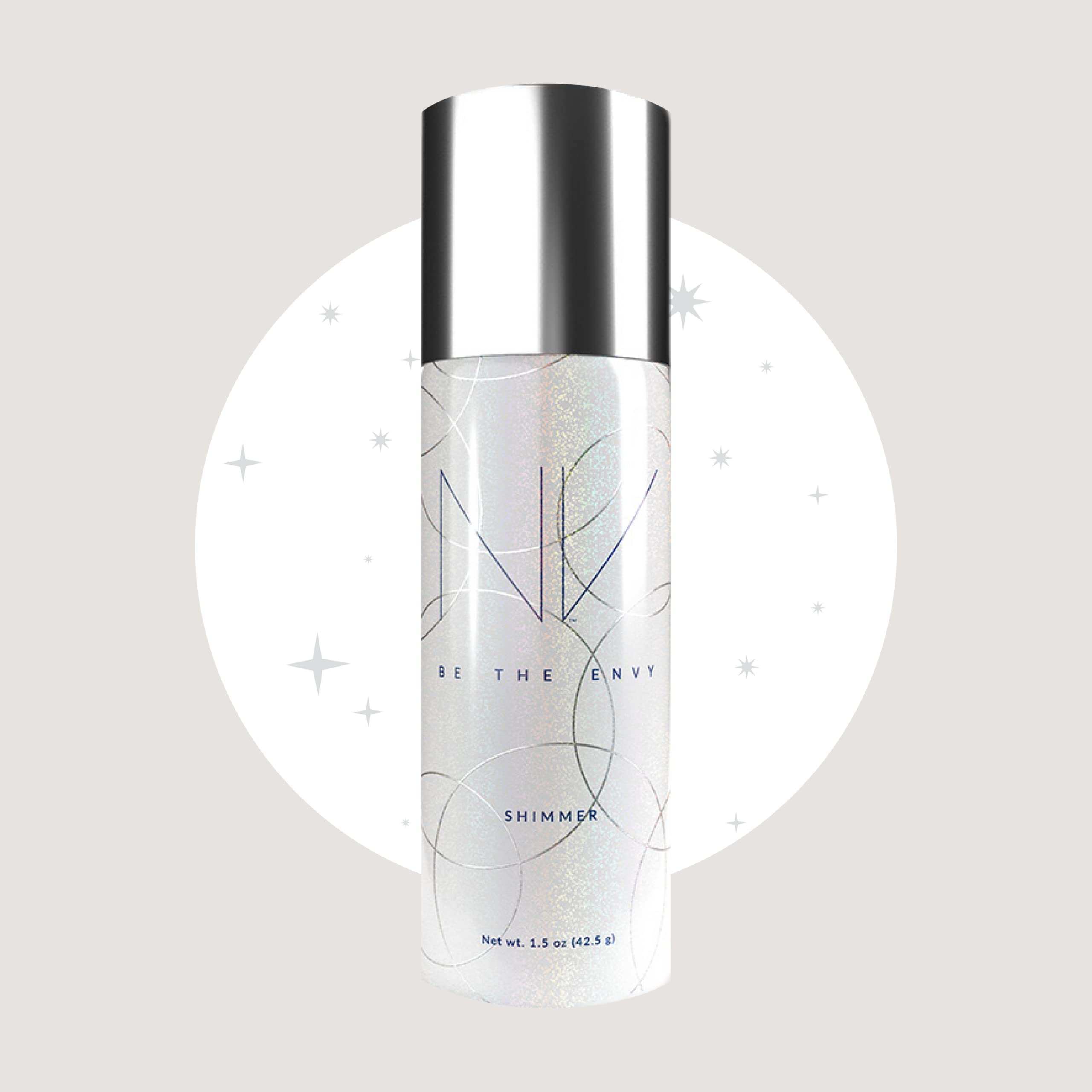 BE THE ENVY NV Perfecting Mist Shimmer glow on cheekbones highlights a moonlit sparkle.