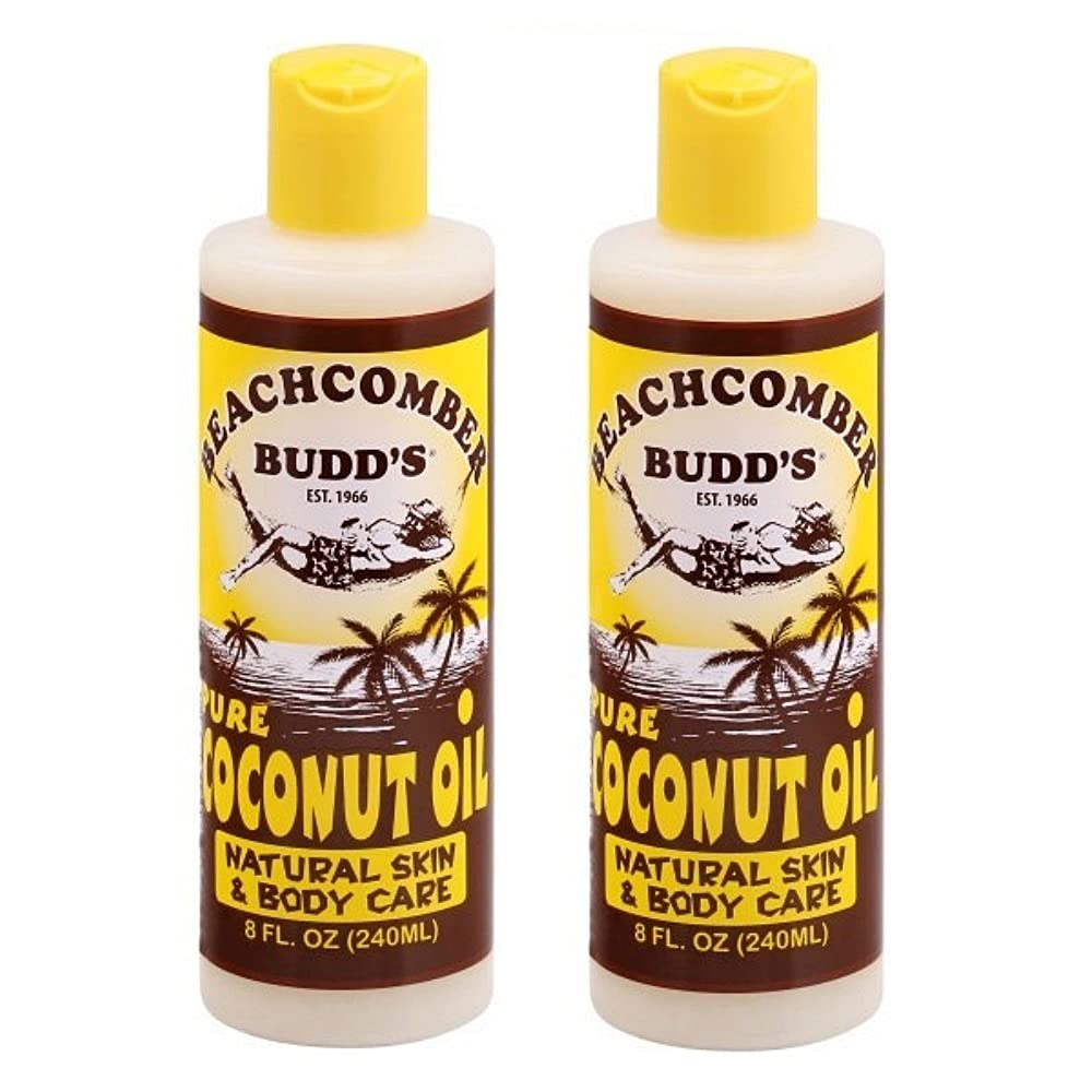 Beachcomber Budd's pure coconut oil bottle, scented, for moisturizing skin and smoothing dry hair.