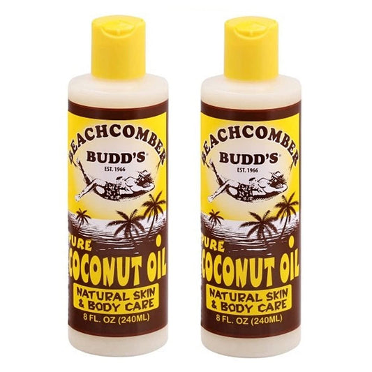 Beachcomber Budd's pure coconut oil bottle, scented, for moisturizing skin and smoothing dry hair.