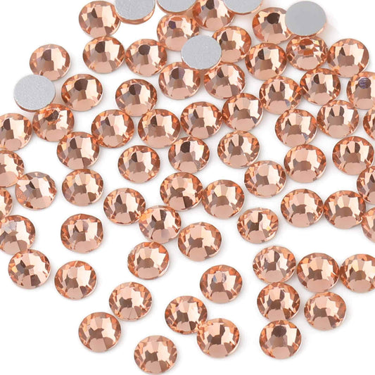 Beadsland champagne flat-back rhinestones for nail art; adds lasting sparkle.